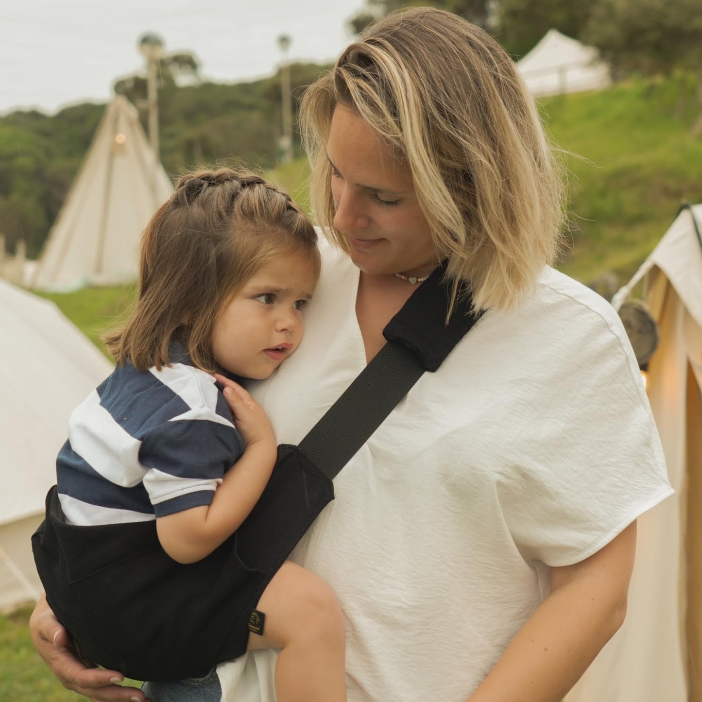 Ergonomic Lightweight Adjustable Toddler Sling Baby Carrier with Zipper Pockets Shoulder Padding Anti Slip Support for Travel Loving Dads and First Time Moms from 12 Months to 3 Years